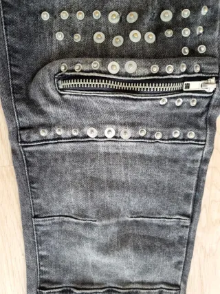 Pantalón vaquero hombre desgastado con cremalleras