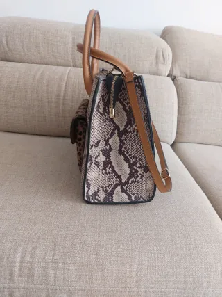 Bolso de piel estampado serpiente y leopardo 