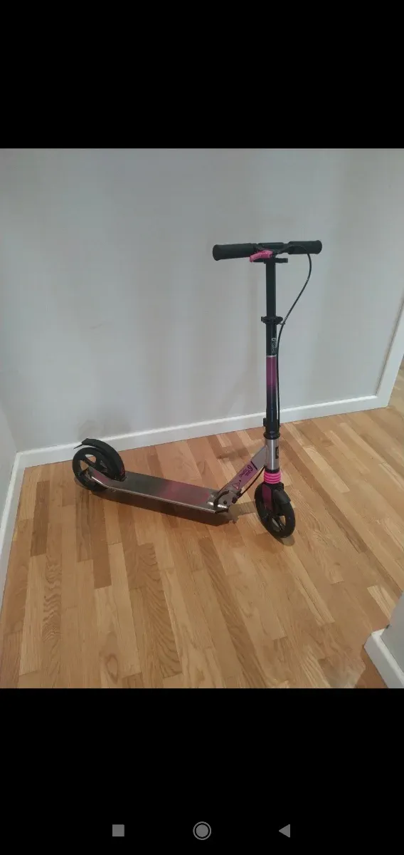 Patinete Oxelo MID9 Rosa cómo nuevo