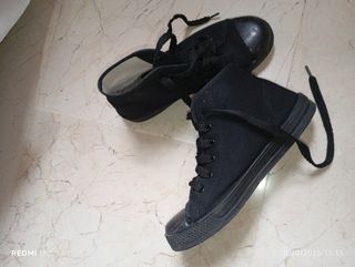 Botas deportivas negras costalero cadete