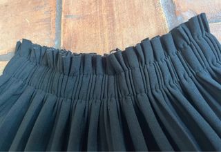 Falda plisada negra talla única