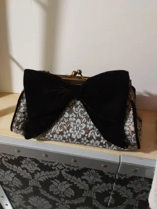 Bolso de fiesta vintage negro y dorado