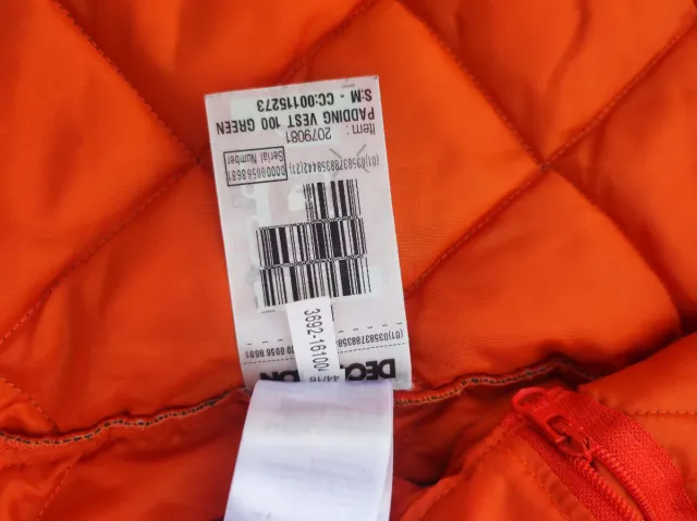 Chaleco acolchado verde y naranja