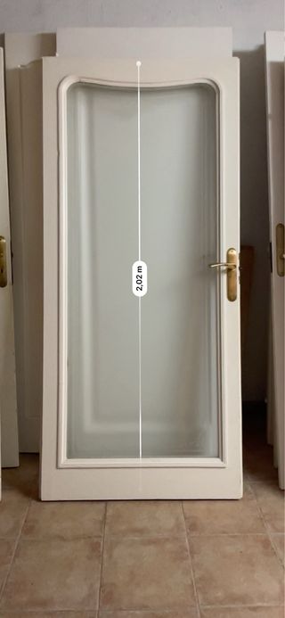 Puertas madera estilo Modernista pintadas blancas