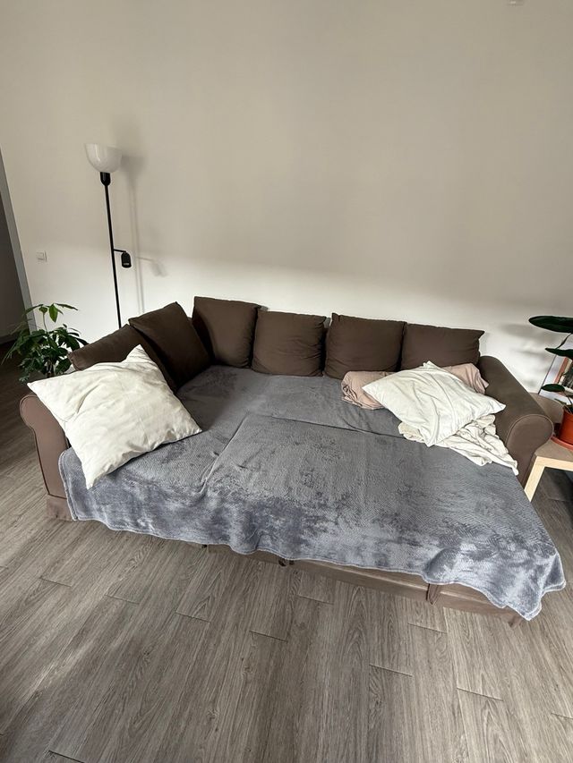 Sofá cama esquinero marrón con almacenaje