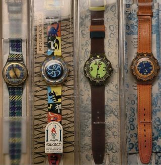 4 Swatch, tres de ellos SCUBA 200 
