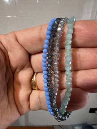 4 braccialetti elastici perline vetro azzurro