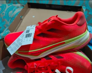 Zapatillas Adidas Supernova naranjas, nuevas.