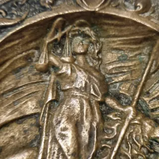 Cenicero antiguo de bronce
