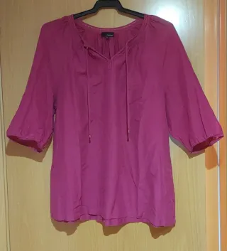 Blusa rosa con cordones