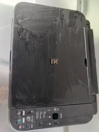 Impresora Canon negra
Impresora HP Gris
