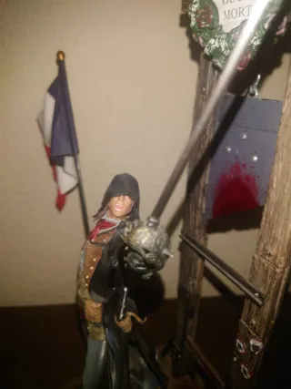 Figura Assassin's Creed con guillotina