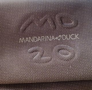 Monedero Mandarina Duck color caqui.