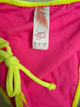 Bikini amarillo con detalles fucsia. sin maeca