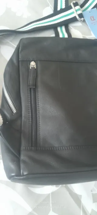 Bandolera de piel negra a estrenar