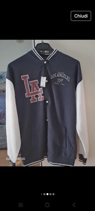 In blocco 4 capi con cartellino.14anni