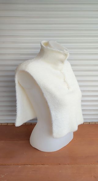 Capa de punto blanca