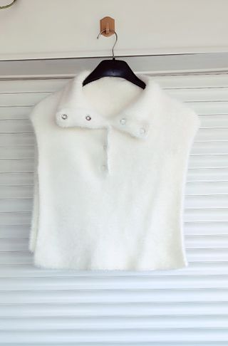 Capa de punto blanca