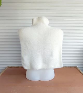 Capa de punto blanca