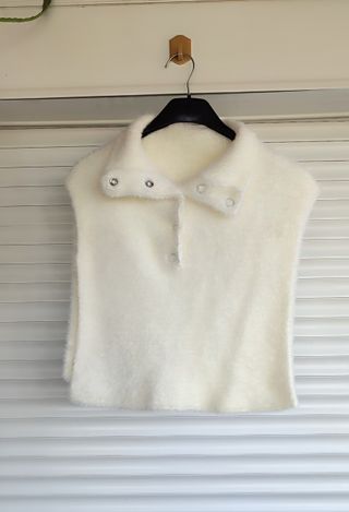 Capa de punto blanca