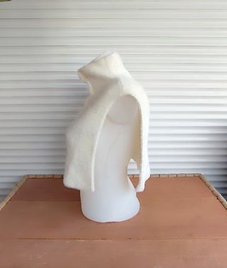 Capa de punto blanca