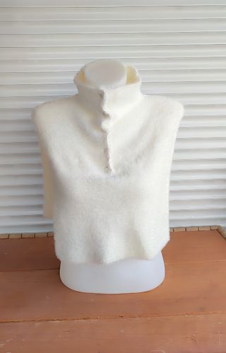 Capa de punto blanca