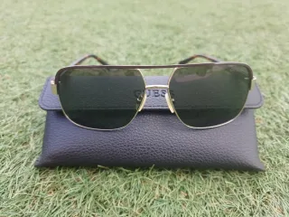 Gafas de sol Guess hombre marrones y doradas