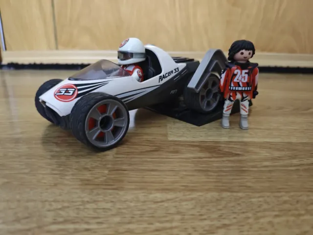 Coche Playmobil con lanzadera y 2 muñecos