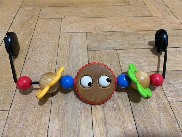 Hamaca BabyBjorn con barra juguetes y funda