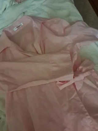 Camisa cruzada rosa con lazo