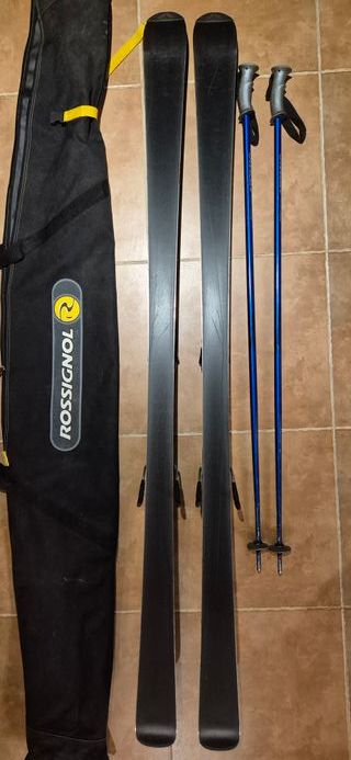 Esquís Atomic Beta Carv con bastones y funda