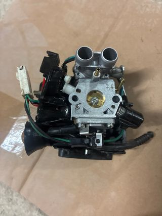 Carburador Husqvarna 560 XP 
con filtro