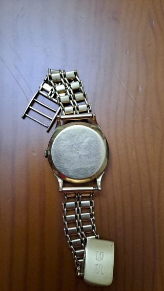 Reloj Longines de oro antiguo con correa