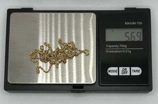 Cadena Salomónica de oro de 18k, 5.69 g, 64 cm.