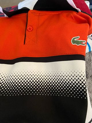 Polo Lacoste Naranja y Negro Talla M