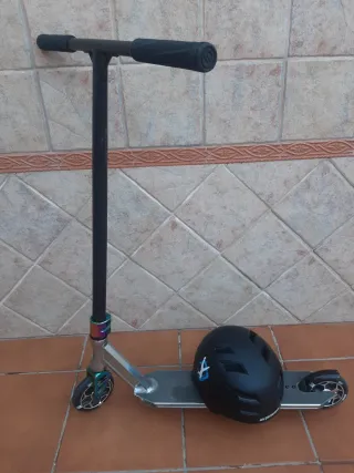 Patinete freestyle con casco ,marca 
OXELO