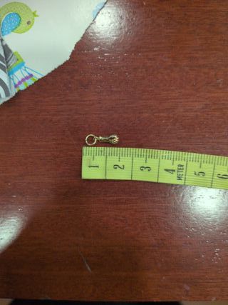 Mini colgante puñito oro