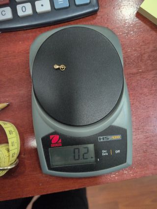 Mini colgante puñito oro