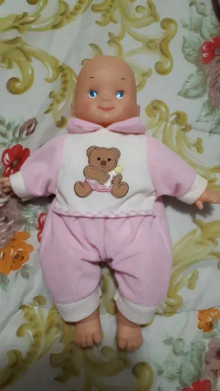 Bambola neonato in tutina orsetto