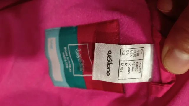 Traje de nieve rosa y blanco talla 12años