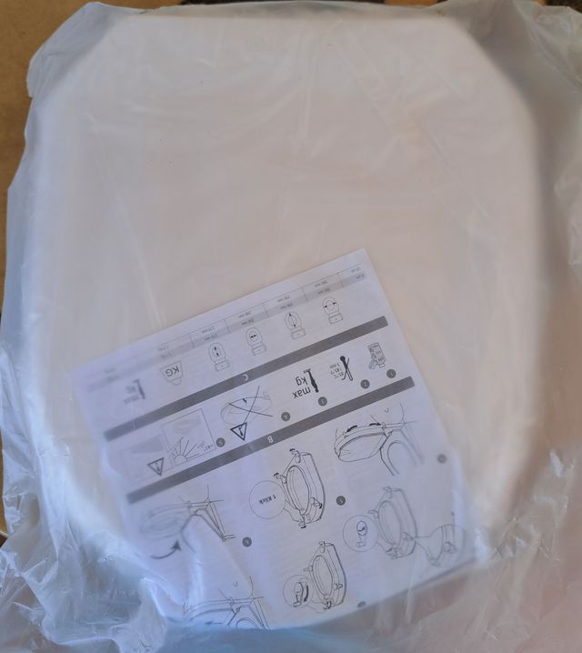 Asiento elevador para inodoro