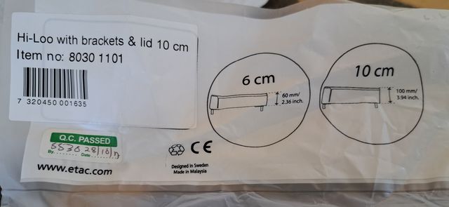 Asiento elevador para inodoro