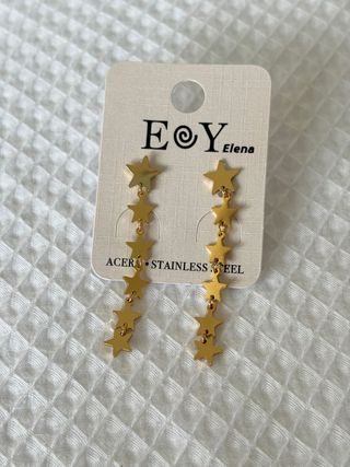 Pendientes largos de estrellas doradas - Nuevos