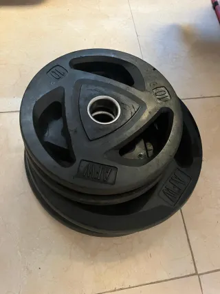 Par de discos de 10 y 20 kg. Marca AFW