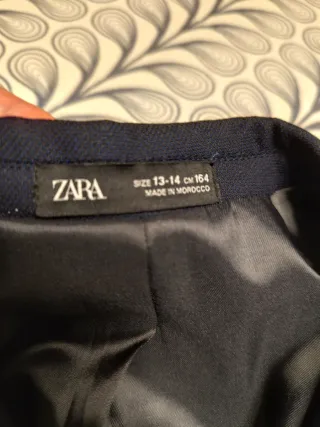 Americana niño azul marino. 