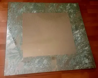 Espejo de baño con marco decorado