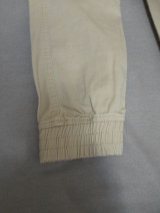 2 pantaloni ragazzo beige/giallo taglia 44