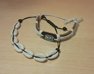 2 Pulseras de Conchas y Elefante