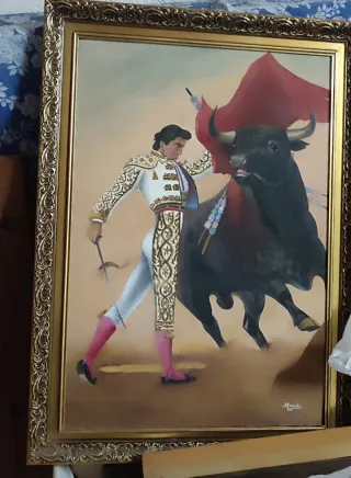 Cuadro de tauromaquia con toro y torero