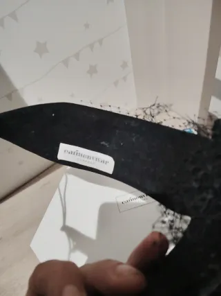 Tocado de fiesta negro y plateado